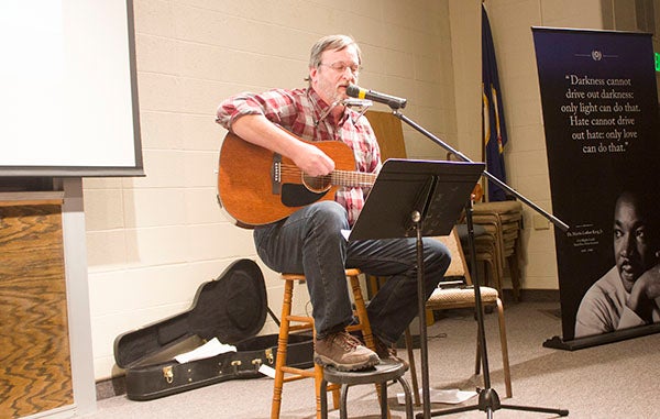 Tom Muschler performs Thursday night at Riverland Community College during the 28th annual Martin Luther King Jr. celebration in Albert Lea. - Sam Wilmes/Albert Lea Tribune