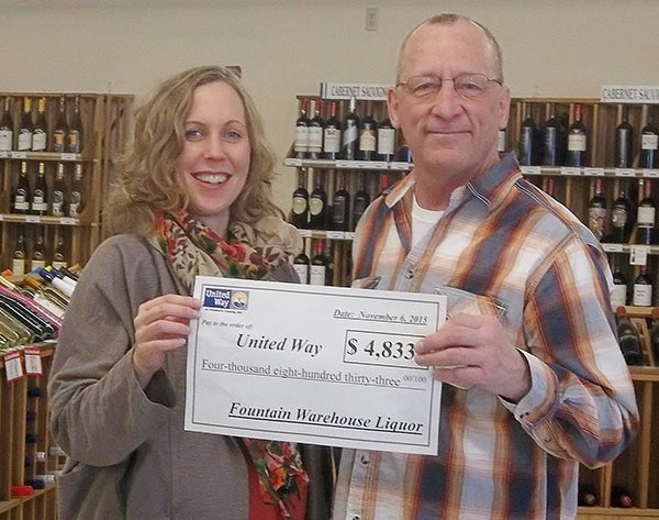 The Fountain Warehouse Liquor wine tasting in November raised over $4,800 for the United Way of Freeborn County. United Way Director Ann Austin accepted the donation from Ron Freeman, owner of Fountain Warehouse Liquor. -Provided