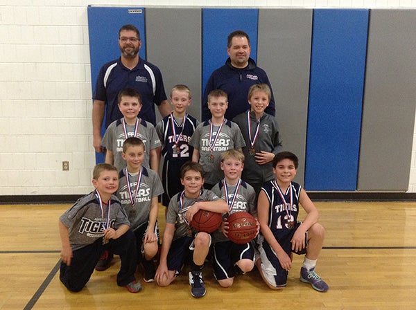 The Albert Lea fourth-grade boys’ traveling basketball team took second place Jan. 23 at an Owatonna tournament. They defeated Byron and Tri-City United to earn their medals. Pictured are, front row, manager Charlie Irvine, Kayden Johnson, Jack Skinness, Henry Buendorf and Spencer Jones. Pictured, second row, are Max Irvine, Grant Adams, Reese Jeffrey and Bowen Jensen. Pictured, third row, are coaches Brad Skinness and Troy Irvine. Not pictured are Luke Olson and coach Tom Jones. The fourth-graders, now 3-2 on the season, jump back into action Feb. 6 in a tournament at Alden. - Provided