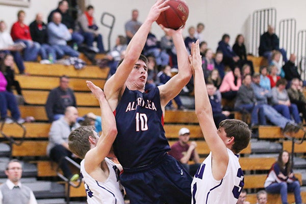 Albert Lea’s Jake Kilby puts up a shot during Monday’s 70-65 victory over New Ulm at Albert Lea High School. -Laura Mae’s Photography/For the Albert Lea Tribune