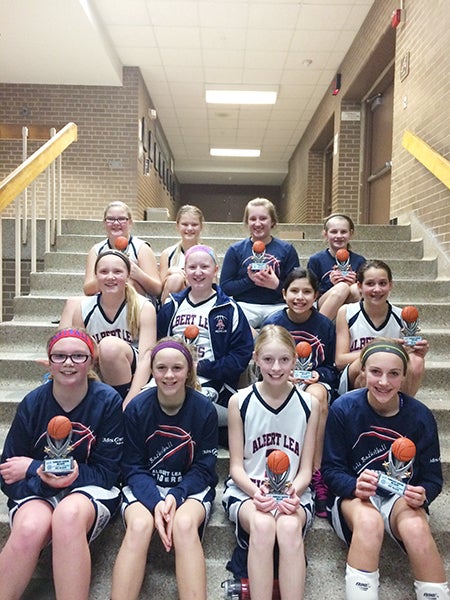 The Albert Lea sixth-grade girls’ basketball team was undefeated Jan. 24. They topped teams from Faribault, Rochester Mayo and Bethlehem Academy to take home the first place trophy at the Faribault Winter Blast Tournament. Pictured, front row, are Jordan Juveland, Kenzie Romer, Stephanie Vogt and Taya Jeffrey. Pictured, middle row, Lindsey Bizjak, Michelle Leeman, Satera Villereal and Annika Veldman. Pictured, back row, are Haley Ball, Hailey Strom, Marissa Leeman and Lauren Fredrickson. - Provided