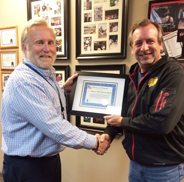 Veteran Service Officer Ron Reule presents Ron Hunter with a certificate of appreciation to Hometown Broadcasting POWER 96 and KQAQ-AM for their continued support of local veterans and their families. Listeners can catch their ‘“Voice of Veterans” program 11:40 a.m. every Monday. - Provided