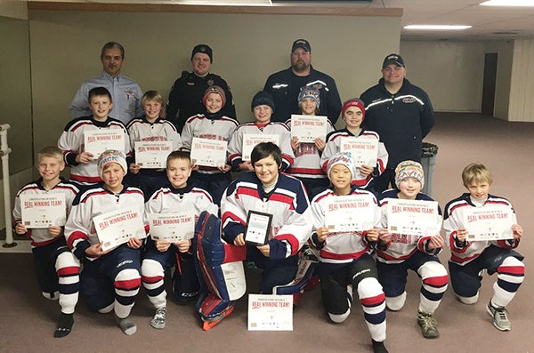 The Waseca Hockey Association, in partnership with Youth 1st, the Walser Foundation and the Minnesota State University Mavericks have selected the Albert Lea A Squirt youth hockey team as a Youth 1st Team Award winner for its outstanding sportsmanship during the Waseca Hockey Association’s Squirt A Tournament. Pictured in the front row, from left, are Blaine Bakken, Jack Ladlie, Dirk Fornwald, Dakota Jahnke, Joseph Yoon, Gavin Quam and Eli Farris. Pictured, middle row, are Keygan Lundak, Beau Schreiber, Josh Behrends, Max Edwin, Spencer VanBeek and Tim Chalmers. Pictured in the back are Mark Arjes of Youth 1st, assistant coach Steve Charboneau, and head coaches Travis Quam and Jason Fornwald. -Provided