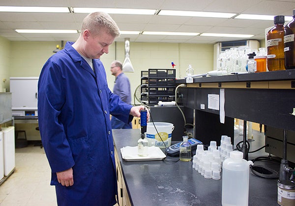 Lab technician Brandon Huston tests for dissolved oxygen, one of the parts of the city’s waste discharge permit. — Sam Wilmes/Albert Lea Tribune