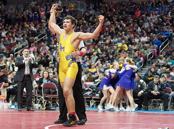 Lake Mills' Slade Sifuentes celebrates winning the Class 1A championship Saturday at Wells Fargo Arena in Des Moines. - Lory Groe/For the Albert Lea Tribune