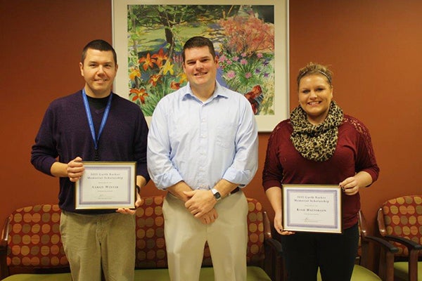 Aaron Winter, left, and Kiah Halvorson were recently awarded Garth Barker Memorial Scholarships. Josh Barker, center, is a Garth Barker Memorial Scholarship Fund committee member and son of Garth Barker. - Provided