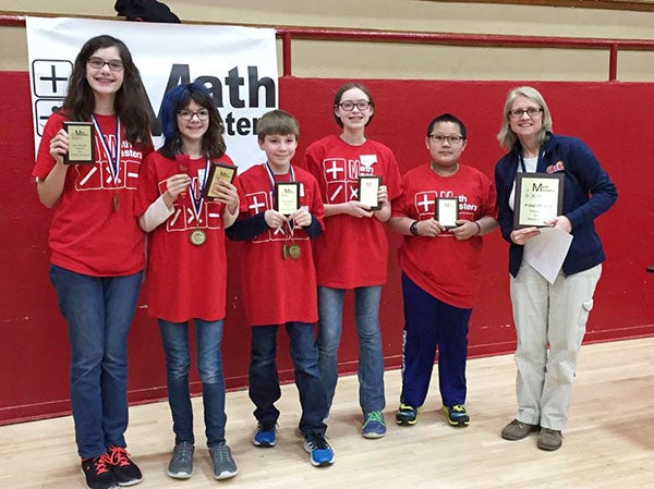 Southwest Middle School’s Purple Team took first place at the Math Masters competition Thursday in Austin. Members of the team were Jenna Kleven, Leon Kong, Samantha Brumbaugh, Henrik Lange and Adriana Brumbaugh with their advisor Robin Hundley. -Provided