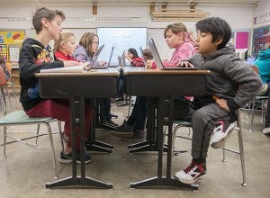Students use computers to help with schoolwork Thursday in Melissa Schmidt’s fifth-grade classroom at Halverson Elementary School. - Colleen Harrison/Albert Lea Tribune