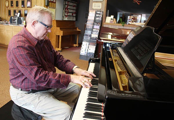 Dewey Kruger has owned Dewey Kruger Music in Northwood for 35 years this year. - Sarah Stultz/Albert Lea Tribune