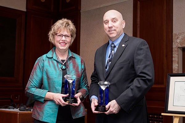 Tonia Lauer and Robert Cima receive the Mayo Clinic Diamond Quality Fellow Lifetime Achievement Award. -Provided
