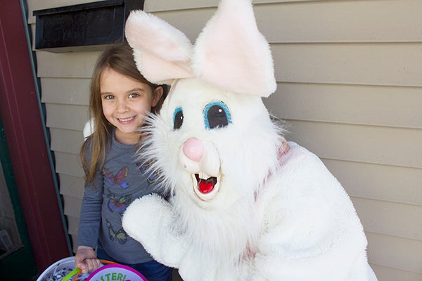 Ryleigh Sabinish, 5, receives an Easter basket from the Easter Bunny Friday morning. -Sam Wilmes/Albert Lea Tribune