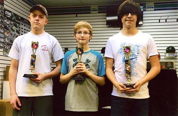 Winners of the 2016 Youth City Tournament were, from left, Caden Reichl, second place; Kyle Splide, fourth place; and Nick Olson, first place. Not pictured is Mattie Lestrud, third place. - Provided