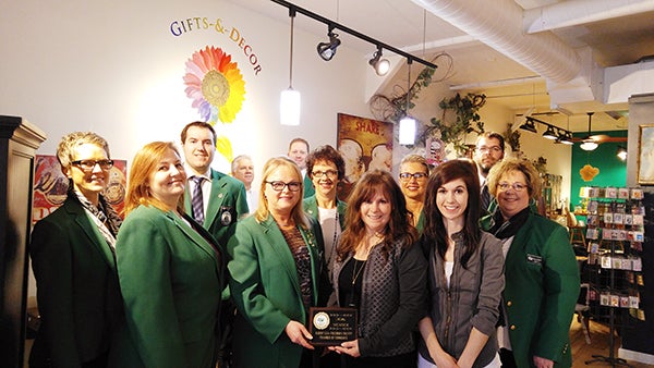 Albert Lea-Freeborn County Chamber of Commerce Ambassadors welcome Judy Mummert from The Color Wheel Gifts & Decor to the Chamber. - Provided