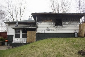 The Nielsen home, 2201 Gene Ave., will have to be bulldozed due to damage sustained in a Feb. 12 fire. - Sam Wilmes/Albert Lea Tribune