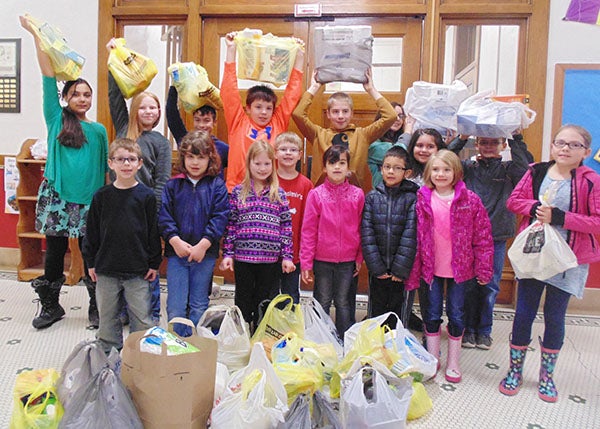 Through the school’s Easter activities to help feed the hungry, the Wells Food Shelf was the recipient of 169 pounds of donated items and $20 in cash from the students of St. Casimir’s Catholic School in Wells. -Provided