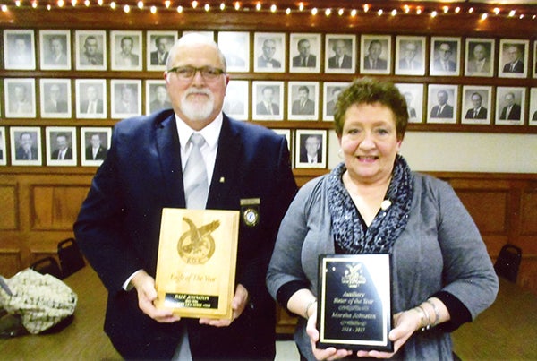 Dale and Marsha Johnston were honored and presented with plaques and pins for their participation in many activities and volunteering through Albert Lea Aeries Eagles Club No. 2258. Dale Johnston was presented with the Eagle of the Year Award and Marsha Johnston was presented with the Sister of the Year Award. - Provided