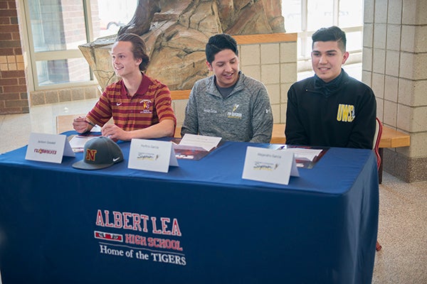 Albert Lea High School athletes Jackson Goodell, Porfirio Garcia and Alejandro Garcia recently committed to playing sports at the collegiate level, and were honored with national letter of intent recognition Wednesday at the high school. Goodell will run cross country for Northern State, and both Porfirio Garcia and Alejandro Garcia will play soccer for the University of Wisconsin-Superior. - Colleen Harrison/Albert Lea Tribune