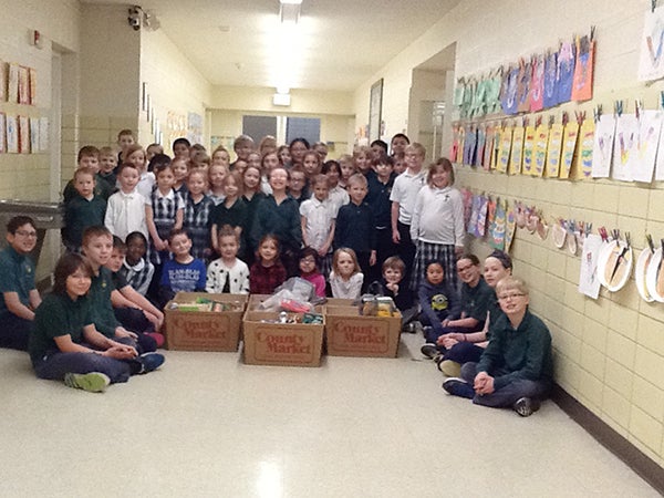 St. Theodore Catholic School students recently collected food for the “Stuff-A-Truck.” - Provided