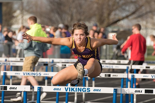 Lake Mills’ Dana Baumann competes in the shuttle hurdles Friday during a track and field meet at Northwood-Kensett. - Lory Groe/For the Albert Lea Tribune