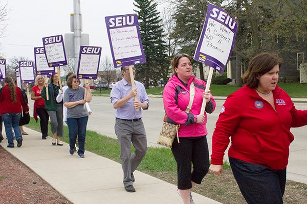 Three dozen union members and members of the public picketed outside Mayo Clinic Health System in Albert Lea to protest proposed contract language for the hospital’s unionized custodial engineers. - Sam Wilmes/Albert Lea  Tribune
