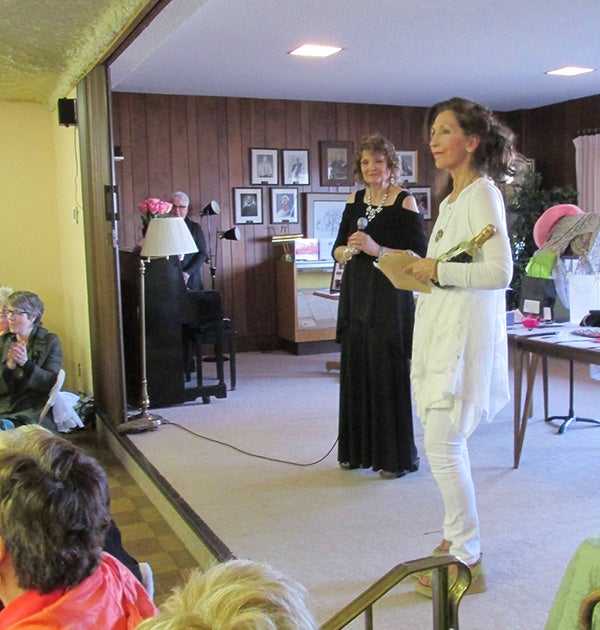 Sue Jorgensen, left, announces a $150,000 donation to the Humane Society of Freeborn County from her mother-in-law Ruth Jorgensen’s estate, during the organization’s All Creatures Great & Small event on April 9. The event featured a brunch with a style show and silent auction. Organizer Clemencia Gujral said the announcement was an exciting moment for the group, and she hopes others will be inspired to leave a legacy. - Provided