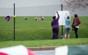 Fans pay tribute to Prince outside Paisley Park Thursday. - Nate Ryan/MPR News