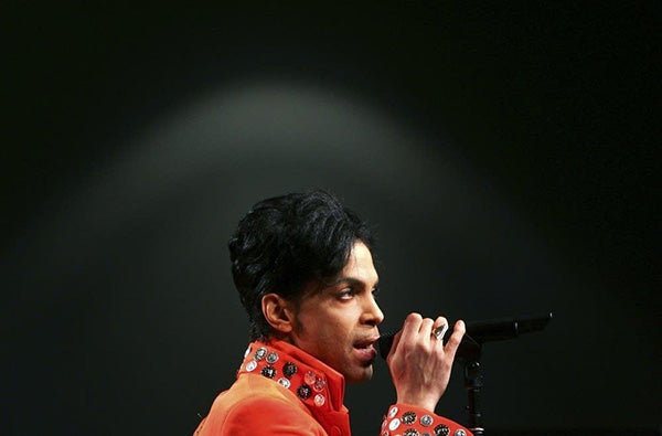 Prince performs during festivities for Super Bowl XLI at the Miami Beach Convention Center in February 2007. - Jed Jacobsohn/Getty Images 2007