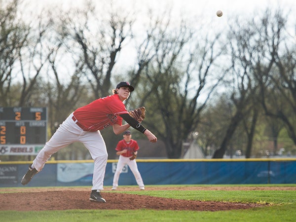 United South Central’s Ryan Kloos throws out a pitch during Thursday’s game against Maple River at Thompson Park. - Colleen Harrison/Albert Lea Tribune