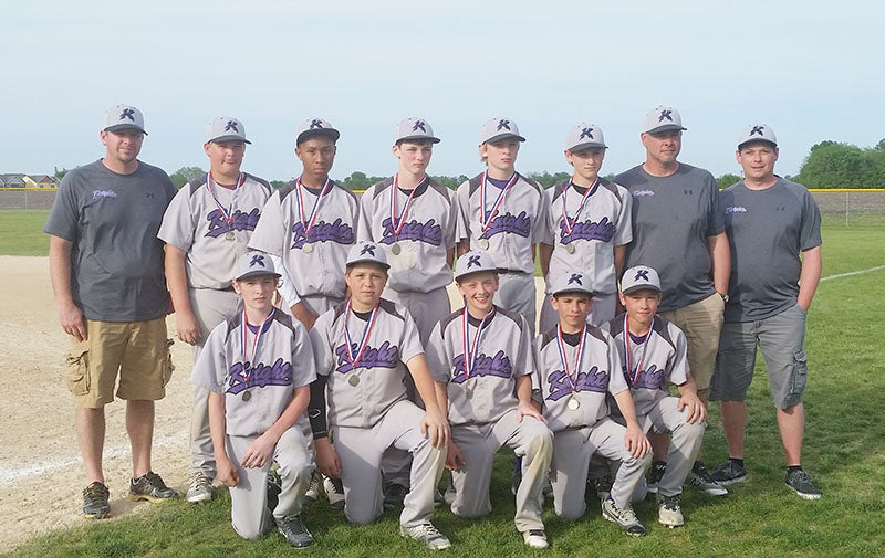 The Albert Lea Knights 13AAA took home the championship at the 2016 Mankato Royals Classic on May 22. Albert Lea beat Shakopee (7-1) in the semifinal game, and beat Chaska (12-5) to win the championship. From left, front row, Markus Dempewolf, Ethan Ball, Caden Gardner, Joe Flores, and Blake Ulve. Back row, coach Brian Gardner, Trevor Ball, Javarus Owens, Jake Weseman, Jack Jellinger, Caden Jensen, coach John Ball and coach Chris Weseman. Provided