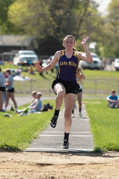 Lake Mills’Hannah Hanson competes in the triple jump event during Thursday’s conference meet. — Lory Groe/For the Albert Lea Tribune