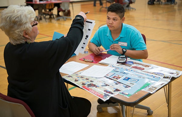 NRHEG had its sixth annual Reality Day Wednesday at the high school, which entails 11th-graders taking the school’s money management course dealing with budgeting for real-life scenarios such as groceries and bills. - Colleen Harrison/Albert Lea Tribune