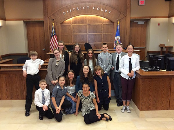 On May 5, 14 sixth-grade students from Southwest Middle School participated in a Mock Trial at the Freeborn County Courthouse. Students involved included Katelyn Holt, Abby Chalmers, Lana Thompson, Cole Janssen, Henrik Lange, Samantha Brumbaugh, Macy Taylor, Colin Farr, Alex Olson, Mackenzie Monson, Isabelle Wegner, Riley Johnston, Leah Rogness and Aliyah Studier. Students were aided in their preparation by Albert Lea High School mock trial coach Neil Chalmers, ALHS mock trial assistant coach Carissa Blizzard, District Court Law Clerk Nathan Wersal and Albert Lea High School mock trial member Emily Wangen. The trial was judged by Wersal in front of a capacity crowd. - Provided 