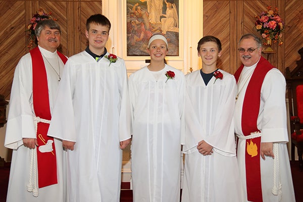 Lunder Lutheran Church celebrated its confirmation day on May 1. The Rev. Bill Peters, far left, and the Rev. Randy Baldwin confirmed Cole Rickert, Samantha Skarstad and Cole Indrelie. - Provided
