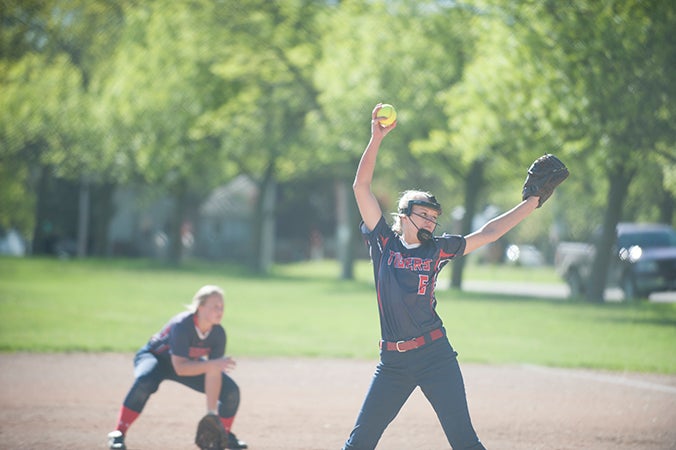 Albert Lea’s Hannah Schilling delivers a pitch in last week’s game against the Winona Winhawks. Schilling has started and pitched in every game for the Tigers this season. 