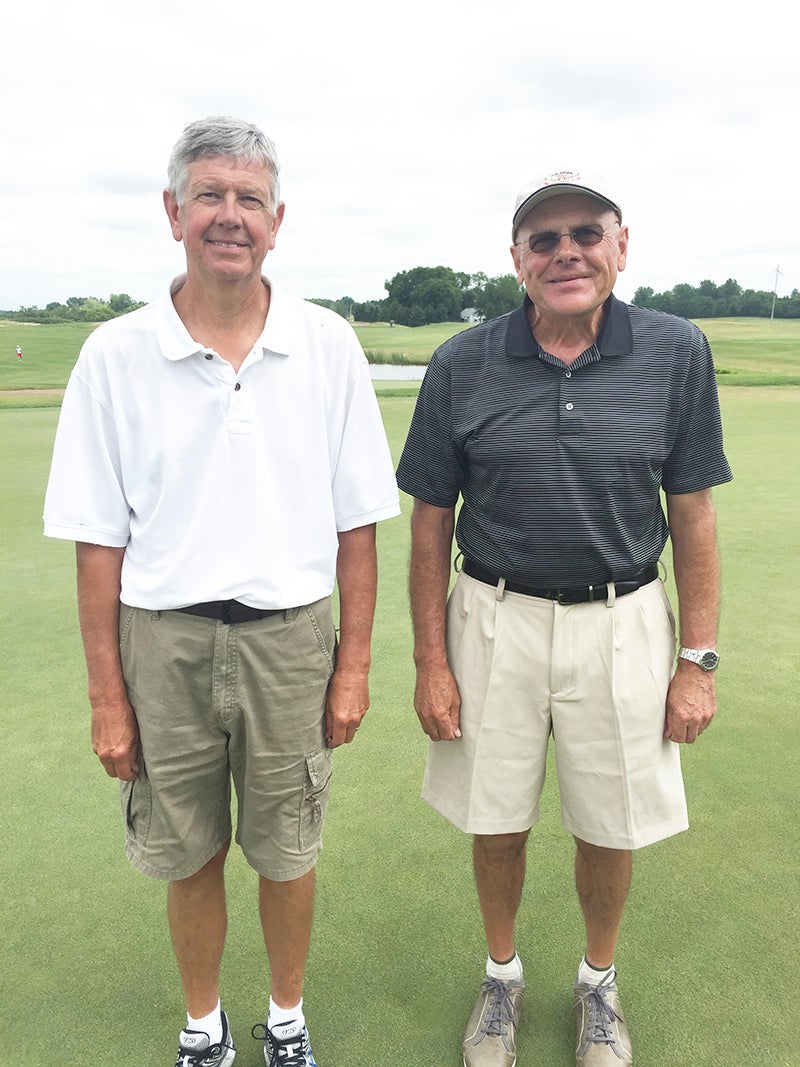 Jim Klapperich, right, made a hole-in-one while golfing with Jess Hyland on Wednesday. The hole-in-one came on hole No. 6, which is a Par 3 at Wedgewood Cove Golf Club. provided