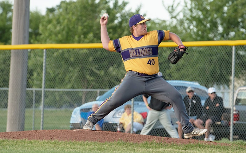 Lake Mills’ Zach Throne throws out a pitch during Wednesday’s game against Eagle Grove in Lake Mills. The Bulldogs won 5-4. - Lory Groe/For the Albert Lea Tribune