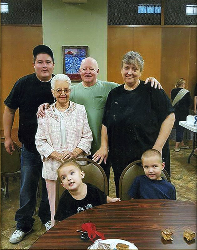 Father Tony Brandt, grandfather Harold Brandt, grandmother Tammy Brandt and great-great-grandmother Helen Brandt pose for a photo with two members of the fifth generation of their family, Alexis and Zayden Brandt. - Provided