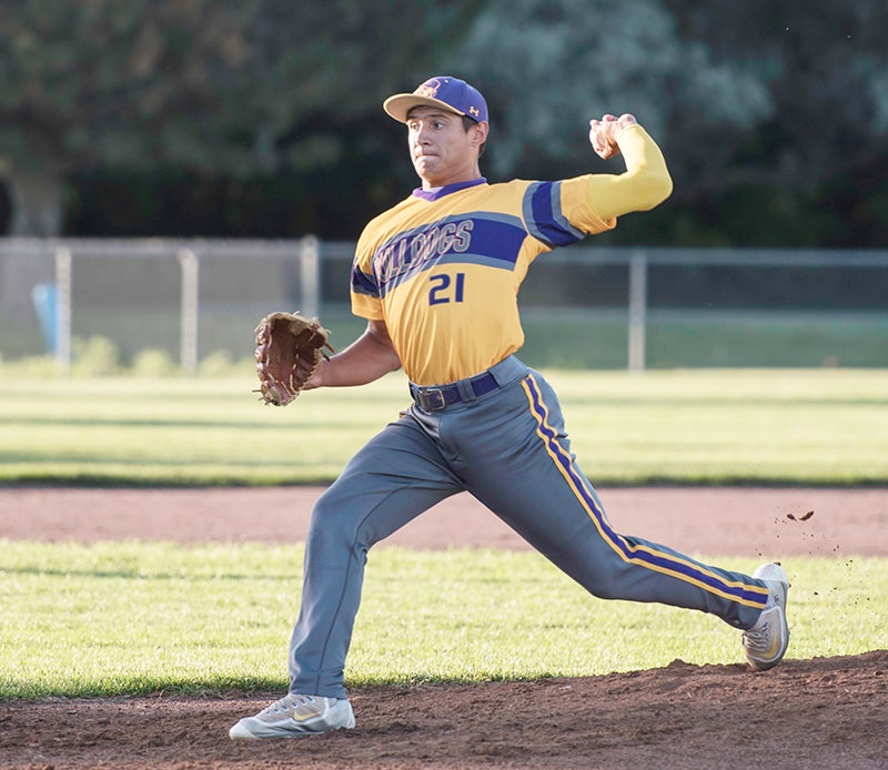 Bulldogs pitcher Slade Sifuentes throws a pitch during Wednesday’s playoff game against Central Springs.