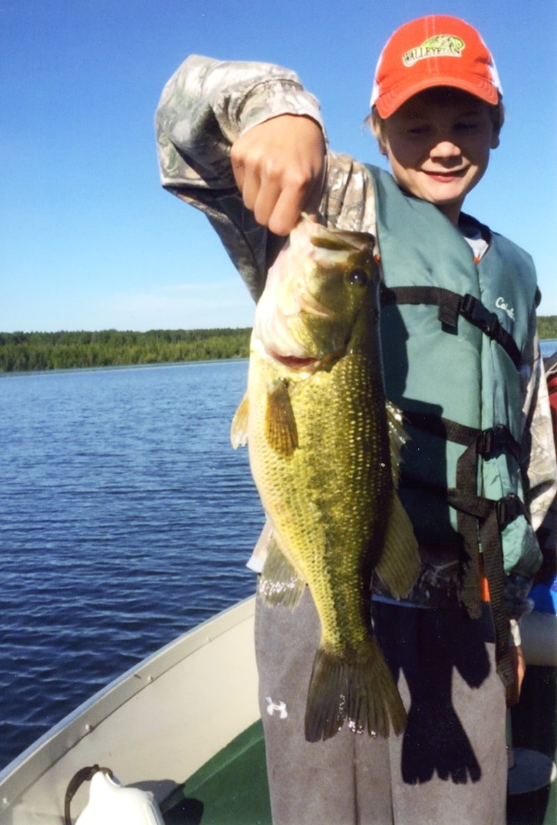 Gavin Nelson, 12, of Clarks Grove reeled in an 18-inch bass during a recent fishing trip to Six Mile Lake in Bena. Nelson is the son of Buck and Angie Nelson. Provided