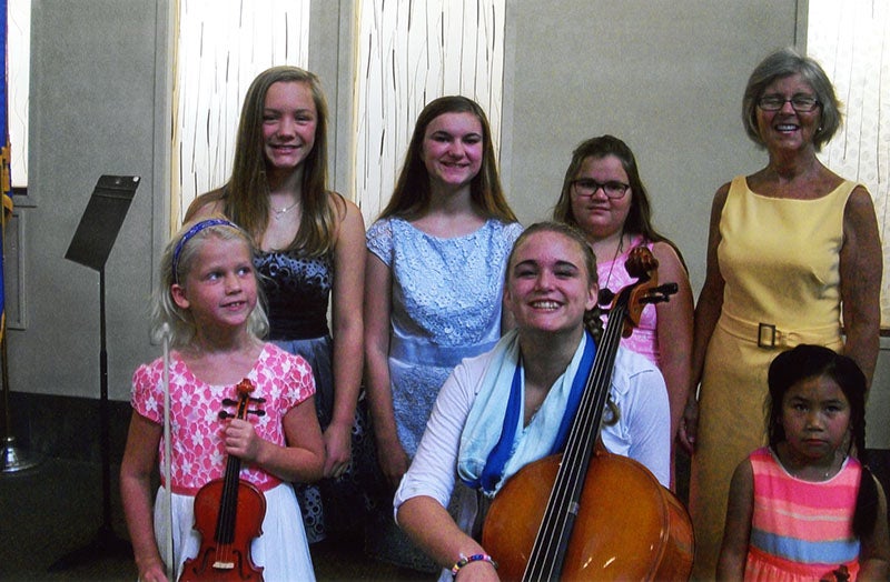 Sharon Astrup-Scott’s music students performed Aug. 3 in the rotunda at Mayo Clinic Health System in Albert Lea. Back row, from left, Elise Grzybowski, Anna Dahl,  Alex Funk, and Astrup-Scott. Front row, from left, Greta Huston,  Emma Barclay, and Kaylan Train. Not pictured is Claire LaFrance. - Provided