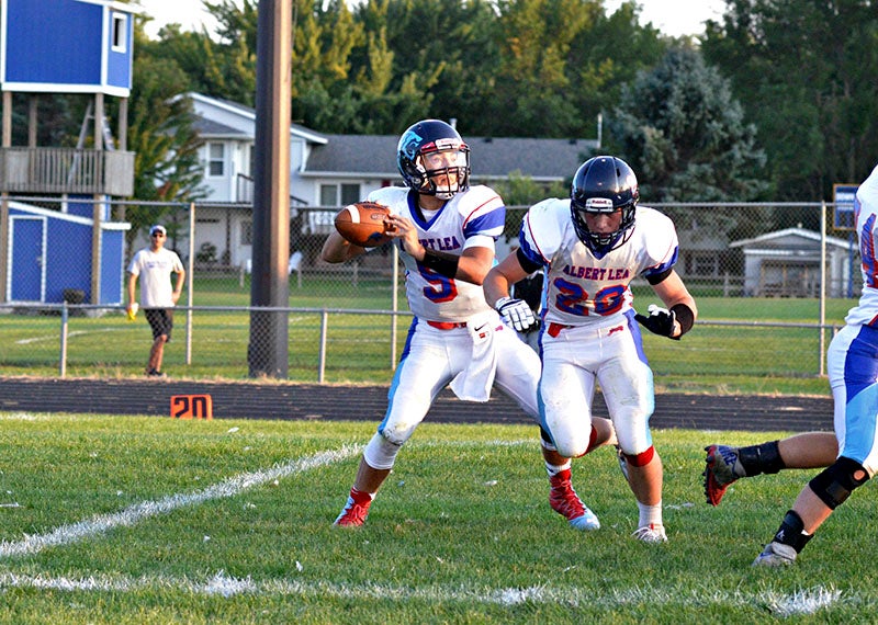 Albert Lea quarterback Sam Chalmers looks for an open man during Thursday’s game against Waseca. Chalmers completed 6-13 passes for 60 yards.