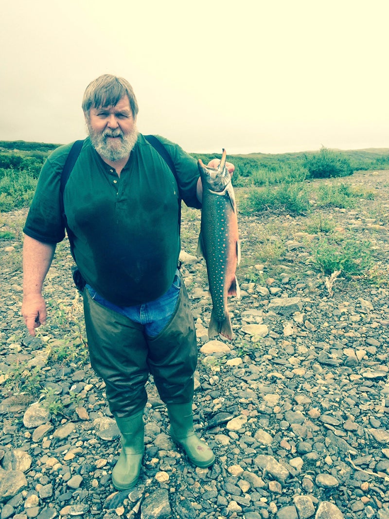 Johnson is shown here with a nice-sized Arctic Char that he caught in a river near Nome, Alaska.