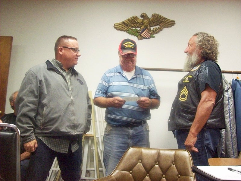 Ted Herman and John Severtson from the Beyond the Yellow Ribbon Campaign received a donation check for the beyond the yellow ribbon of Albert Lea from the director of the American Legion Riders Chapter 56's Duane Thomas. Provided