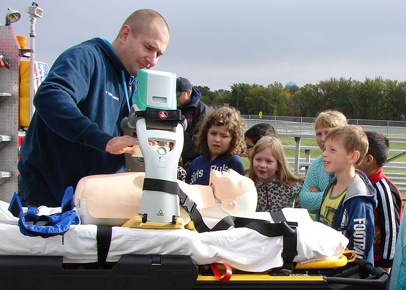 Members of the Wells ambulance squad were on hand at the United South Central High School Farm Safety Day. Squad members demonstrated how some of the lifesaving equipment they have is used to students from St. Casimir’s School in Wells. 