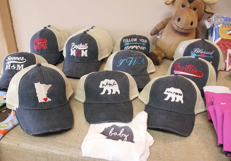 Barnyard Kids sells these embroidered hats for adults at the store. Sarah Stultz/Albert Lea Tribune
