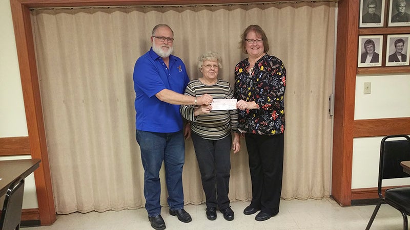Dale Johnston and Carol Peterson present Annette Petersen, director of Senior Resources, with a check for $450 from Albert Lea Aerie’s Eagles Club No. 2248 Monday Nite Taco Committee. - Provided