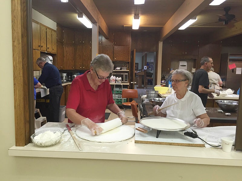 Jayne Williamschen and Margrette Aasen make lefsa in preperation for the annual Time and Talent Bazaar which will take place at Ascension Lutheran Church Saturday. - Provided