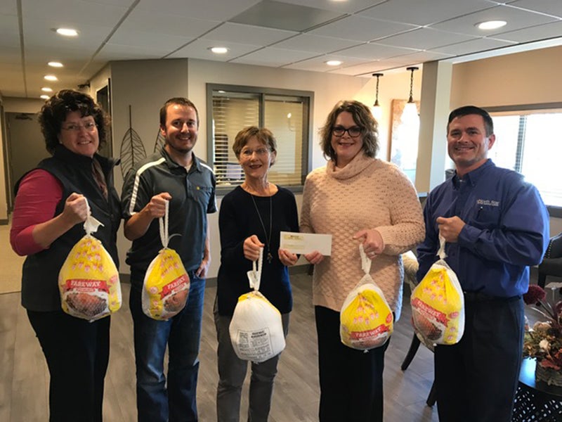 Intego Insurance Services gave five turkeys and a cash donation to the Alden Area Food Shelf. The turkeys were a gift to Intego from North Star Mutual Insurance Companies based on the number of new clients that have joined the company in the past several months. Kathleen Bleckeberg, Brady Gooden,  Co-Director Alden Area Food Shelf Rita Korman, Sarah Hensley and Tom Sloan of North Star Mutual. Not pictured is Keeley Anderson, co-Director Alden Area Food Shelf. - Provided