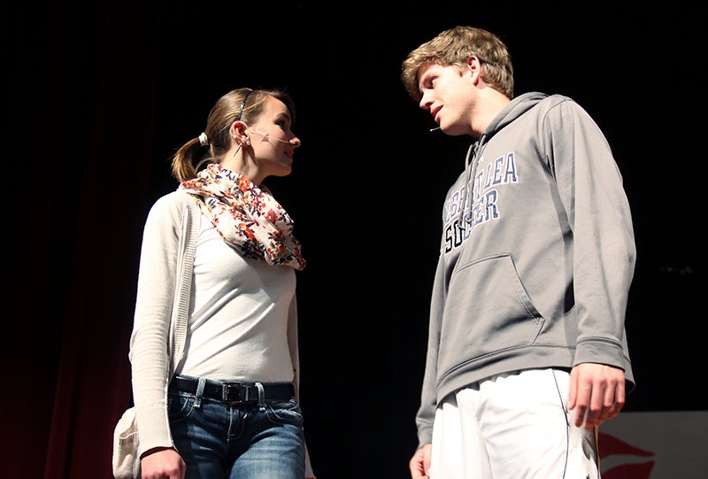 Justine Nelson and Sam Ehrhardt act out a scene as Sandy Dumbrowski and Danny Zuko for the upcoming presentation of “Grease” at Albert Lea High School. - Sarah Stultz/Albert Lea Tribune 