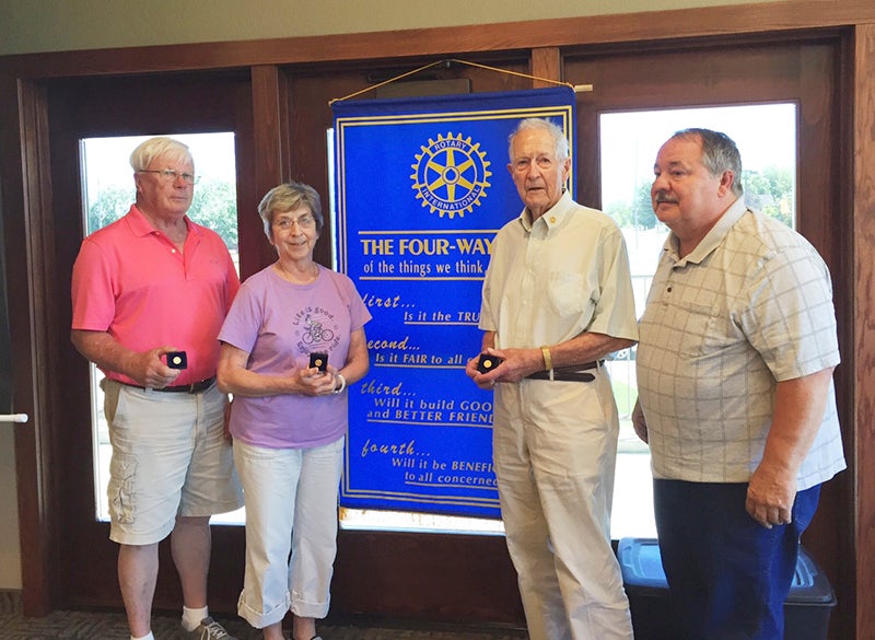 Local Rotarians were recognized as Paul Harris Fellows who have passed the initial contributions. Pictured are Casey Swenson, $4,000; Lilah Aas, $3,000; Earl Jacobsen, $7,000; and John Forman, $4,000. - Provided